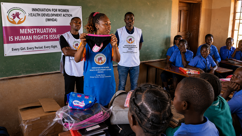 IWHDA team leading a menstrual health education session with schoolgirls in Kabale